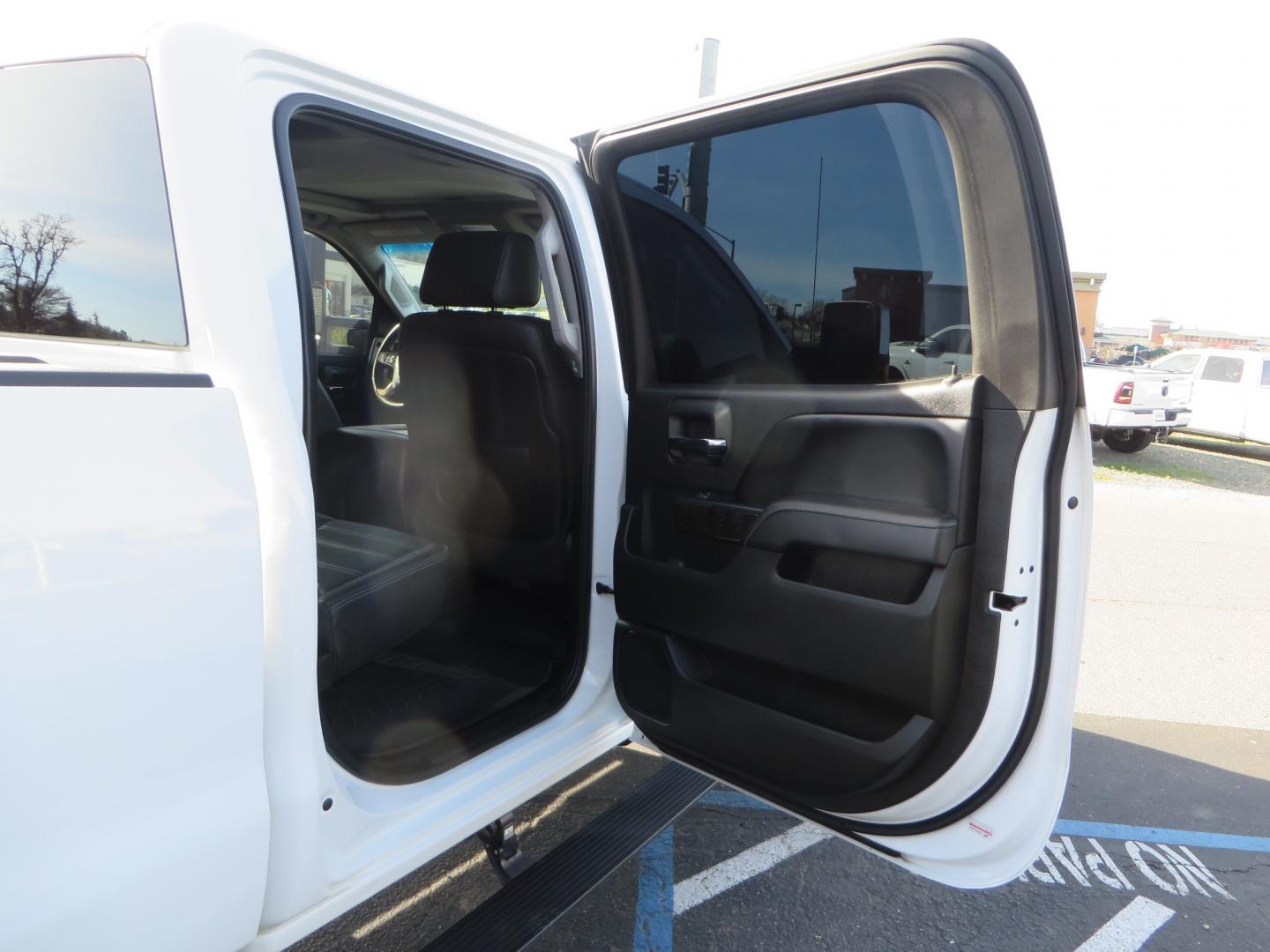 2015 White GMC Sierra 2500 HD Crew Cab Denali (1GT120E88FF) with an V8 Turbo Dsl 6.6L engine, Auto 6-Spd Allison OD transmission, located at 2630 Grass Valley Highway, Auburn, CA, 95603, (530) 508-5100, 38.937893, -121.095482 - 2015 GMC Denali 2500 6.6L Duramax Diesel. Cognito 4-6" lift kit, Cognito traction bars, Cognito idler and pitman support, Kryptonite upper control arms, Fox remote reservoir shocks, Amp power steps, Fuel Offroad wheels, Nitto Ridge Grappler tires, Alpine Stereo Firestone ride rite air bags, Transfer - Photo#49